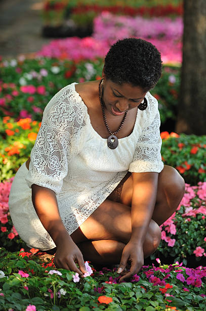 istock Lovely black woman buying plants 175397735