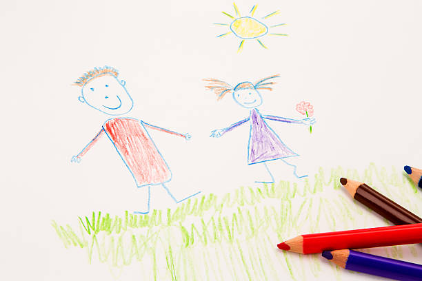 istock KId's drawing with coloured pencils 175398070