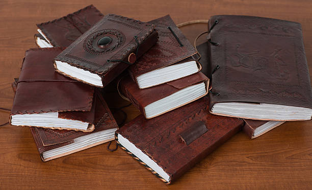 brown leatherbooks diário e notebooks de indiary - guest book note pad writing diary imagens e fotografias de stock