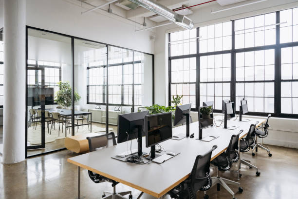 istock Unoccupied task table and meeting room in loft office 1753982506