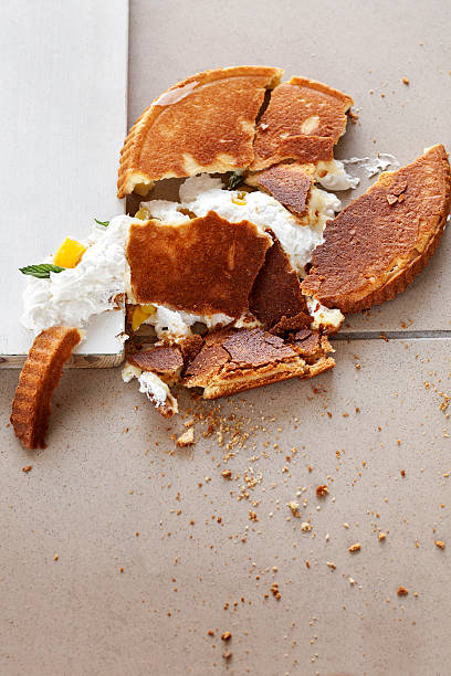 Upside down cake that has been dropped on the floor