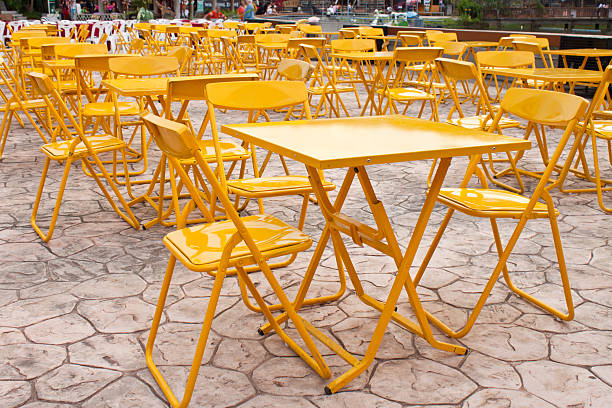 istock yellow tables and chairs outdoor place 175398797