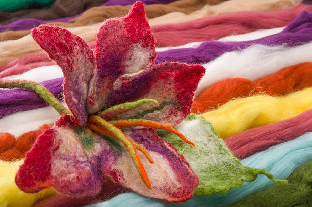 Srings of colored wool and flower made of feltPlease see some similar pictures from my portfolio: