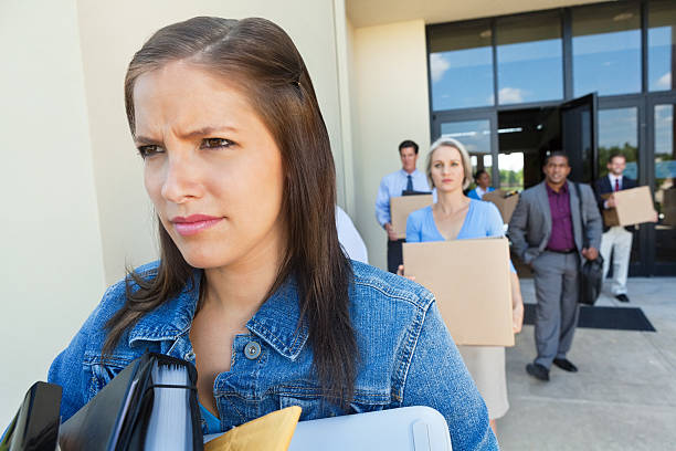 istock Group of unemployed people leaving office after being fired 175399267
