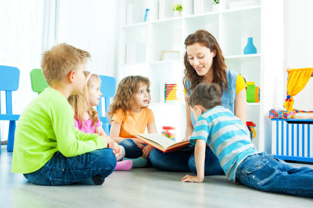 istock Teacher Telling A Story to children. 175399471