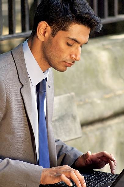 istock Business Man with Laptop 175399786