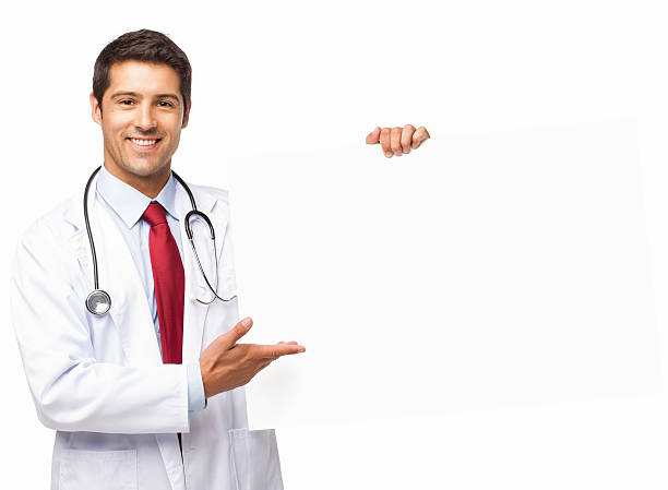 Male Doctor Holding a Blank Sign - Isolated stock photo