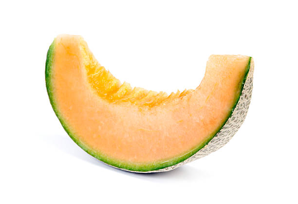 Cantaloupe Melon Sliced Cantaloupe isolated on white background. melon photos stock pictures, royalty-free photos & images