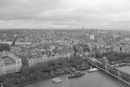 grained aged photo, panoramic view central of London, Big Ben, Parliament, Millennium wheel, UK. View from the sky