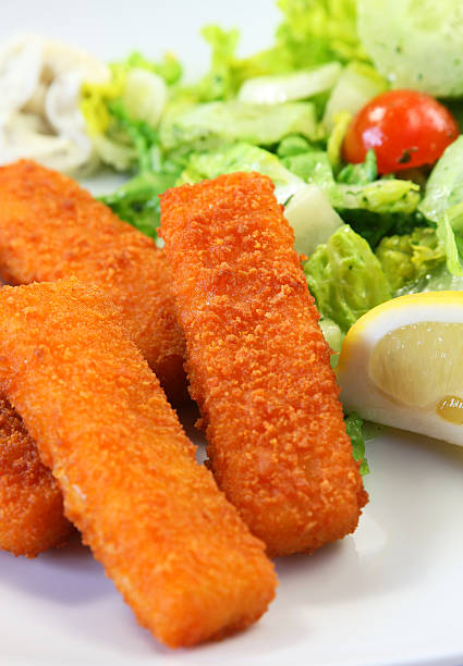 Fish Fingers Fish Fingers and salad fish stick stock pictures, royalty-free photos & images