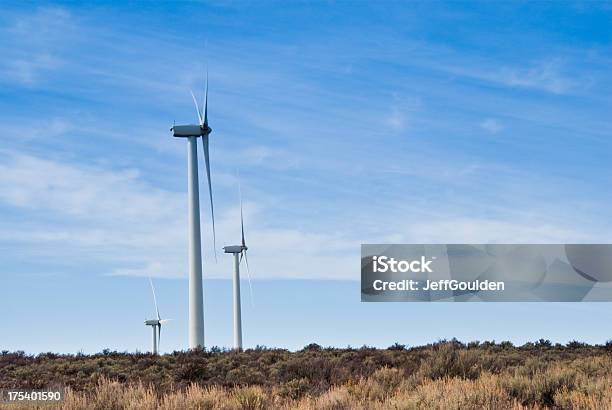 Three Wind Turbines In The Eastern Washington Desert Stock Photo - Download Image Now