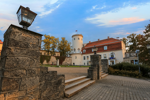 Cesis Latvia 09/30/2023 : Autumn park and  medieval castle in the town Cesis which has 800 years history and one of the mest well-preserved old town in Europe