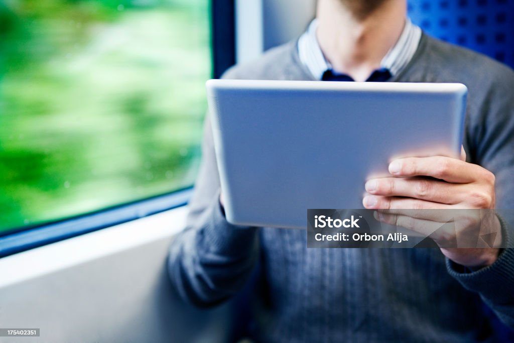Geschäftsmann mit tablet PC im Zug - Lizenzfrei Bewegung Stock-Foto