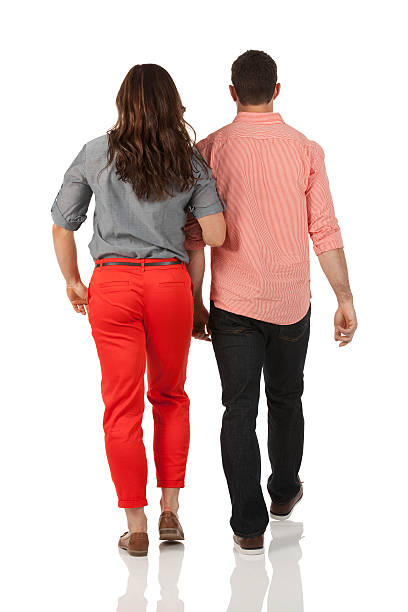 istock Rear view of a couple walking 175402612