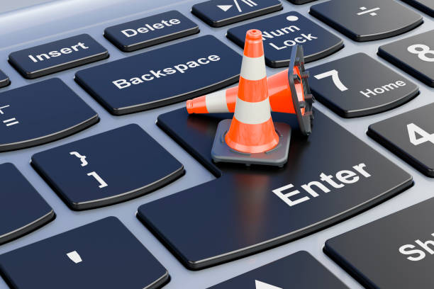 istock Traffic Cones on laptop keyboard. 3D rendering 1754030034