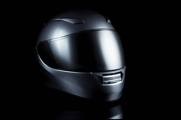 motorcycle helmet on black stock photo