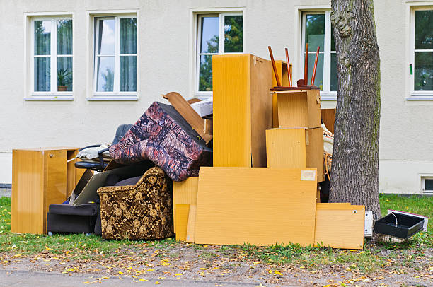 Bulky waste - Sperrmüll Bulky waste - old couch and cabinets. absence stock pictures, royalty-free photos & images