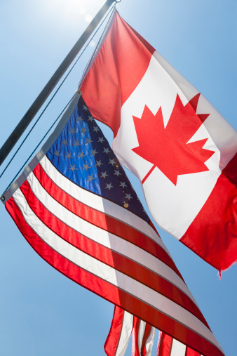 Old Canadian and American flags