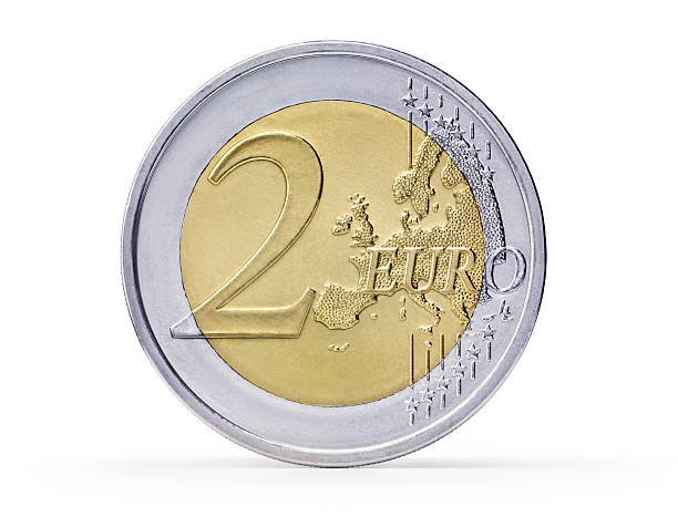 Two Euro coin (+clipping path) A Two Euro coin isolated on white background european union coin photos stock pictures, royalty-free photos & images