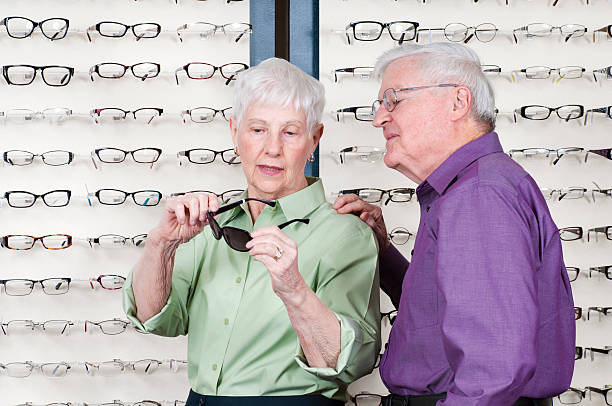 istock Senior Woman Selecting New Sunglasses 175403826