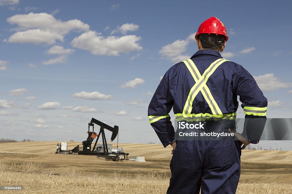 Bohrarbeiter in einem Feld - Lizenzfrei Erdöl Stock-Foto