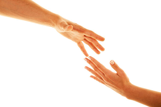 istock Two hands trying to reach in the air 175404433