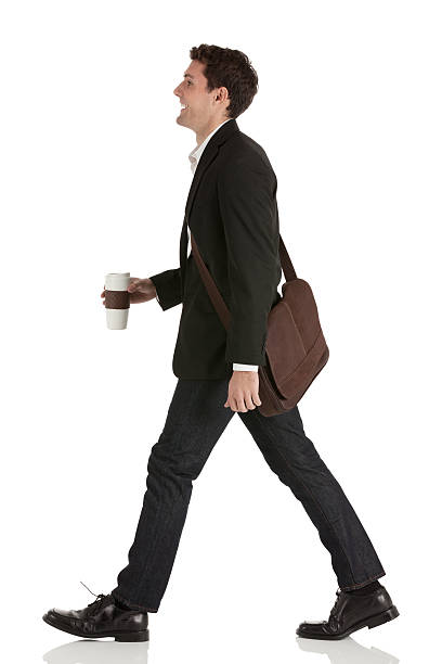 istock Businessman walking with a disposable cup 175404599