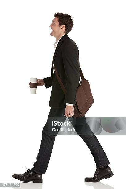 Businessman Walking With A Disposable Cup Stock Photo - Download Image Now - Walking, Cut Out, Men