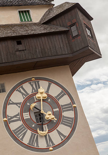 tour de l'horloge de graz - graz clock tower clock austria photos et images de collection