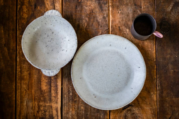 istock A table with plates, soup plates and mugs. 1754049123