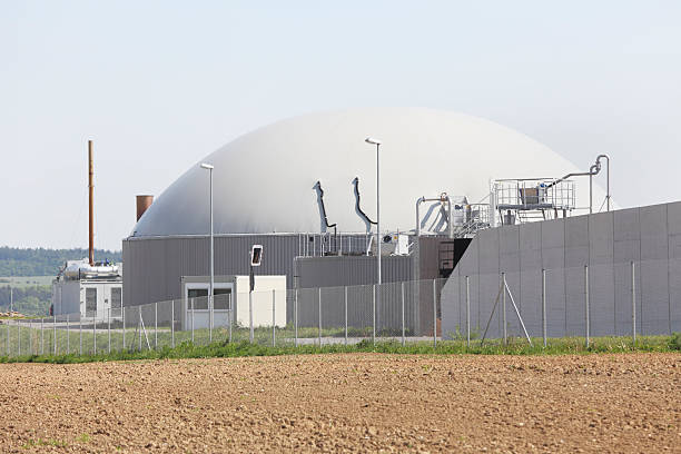 istock bio gas power plant generator behind fresh planted field 175405179