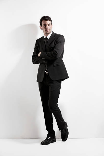 istock Businessman standing with his arms crossed 175405256