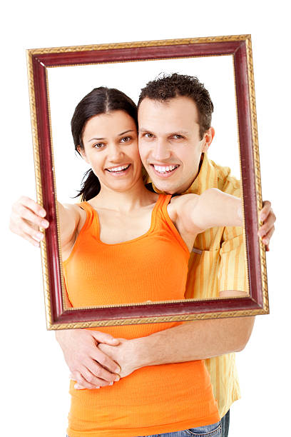 istock happy couple in picture frame 175405440