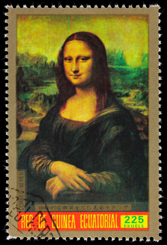 An Equatorial Guinea postage stamp with an image of Leonardo Da Vinci's Mona Lisa.