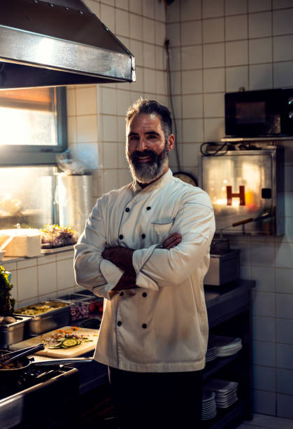 istock Portrait of chef in a restaurant kitchen. 1754057667
