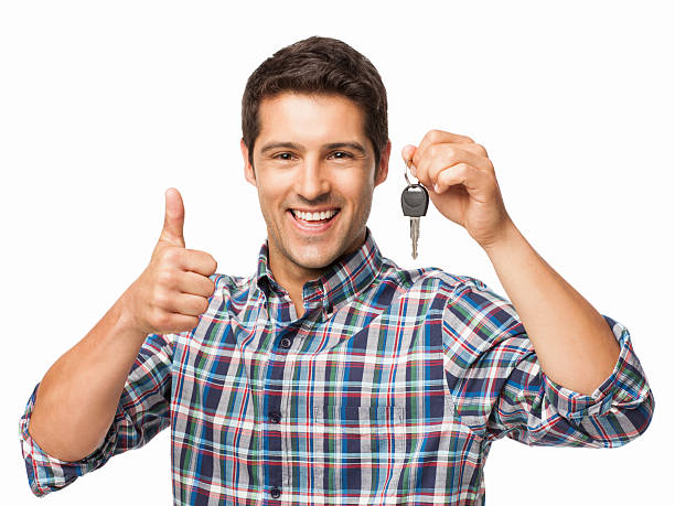 istock Happy Young Man With Car Key - Isolated 175406375