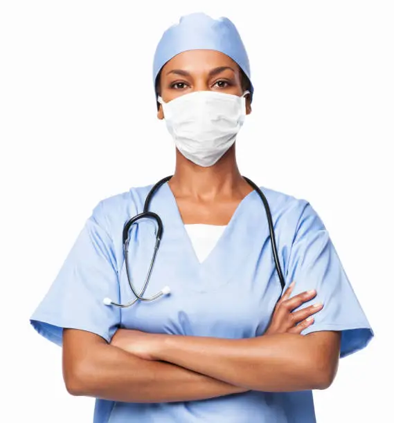 Portrait of an African American female medical professional with surgical mask. Horizontal shot. Isolated on white.