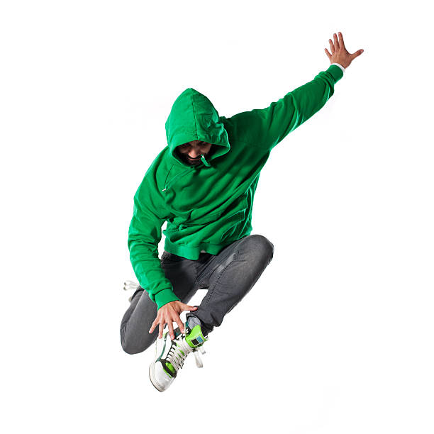 salto joven bailarín - pantalones de baile fotografías e imágenes de stock