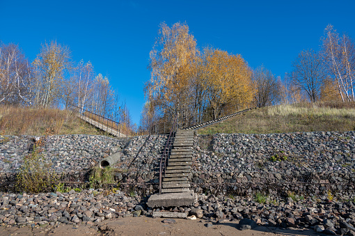 Staircase on the high riverbank.