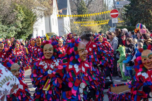 Oberkirch, Germany - February 12, 2023: Traditional carnival parade with traditionell masks and costumes
