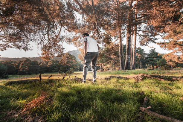 istock Young adult man explorer is contemplating the forest 1754072098