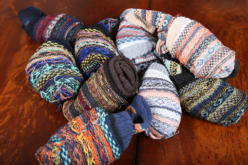 Multiple pair of multi-colored socks