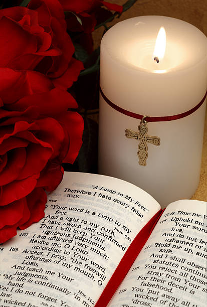istock Psalms Bible Scripture with Candle and Roses 175407479