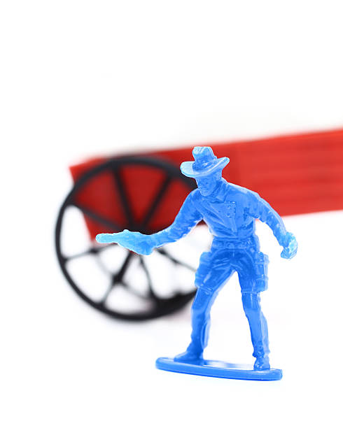 игрушка ковбой с drawn pistol - color image cowboy plastic people стоковые фото и изображения