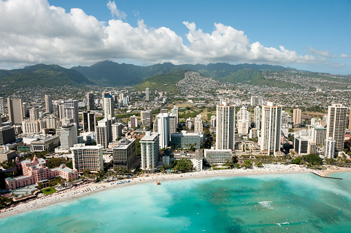 View from above of the Honolulu skyline and Famous Waikiki Beach.
