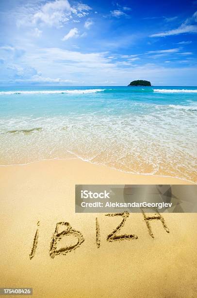 Ibiza Written In The Sand Of A Tropical Beach Stock Photo - Download Image Now - Ibiza Island, Ibiza Town, Balearic Islands