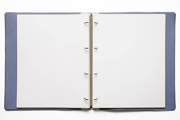 istock Isolated shot of opened blank ring binder on white background 175408528