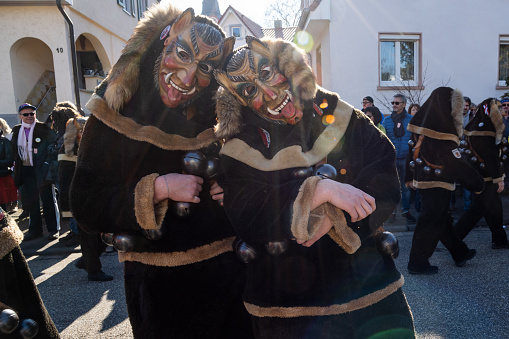 Oberkirch, Germany - February 12, 2023: Traditional carnival parade with traditionell masks and costumes