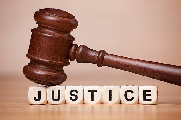 istock Gavel Resting on the Word Justice 175409616