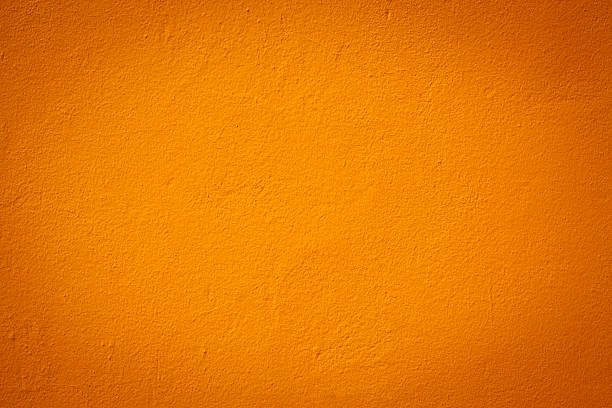 Light orange color wall texture stock photo
